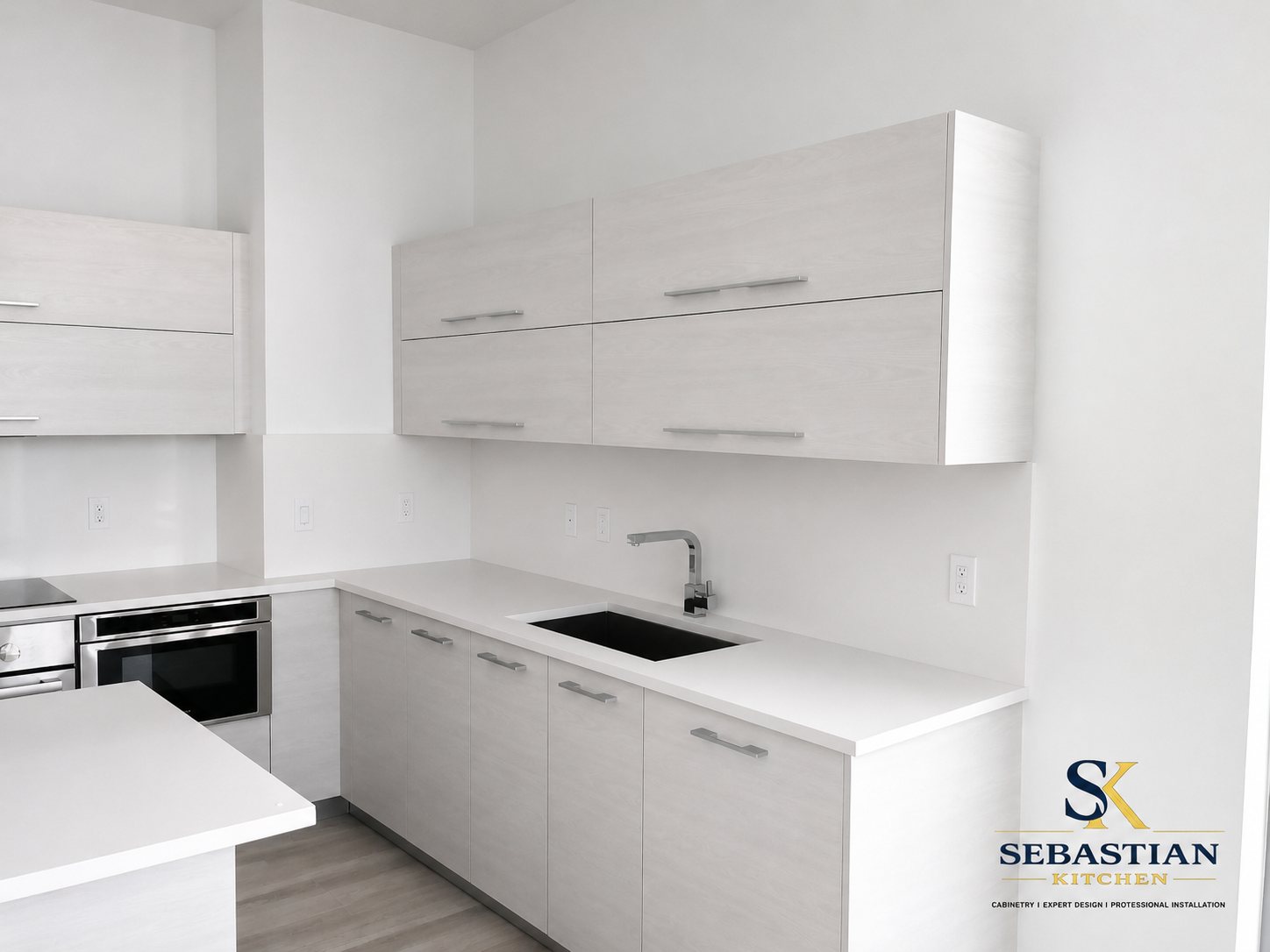 Bright modern kitchen with light wood-grain cabinets